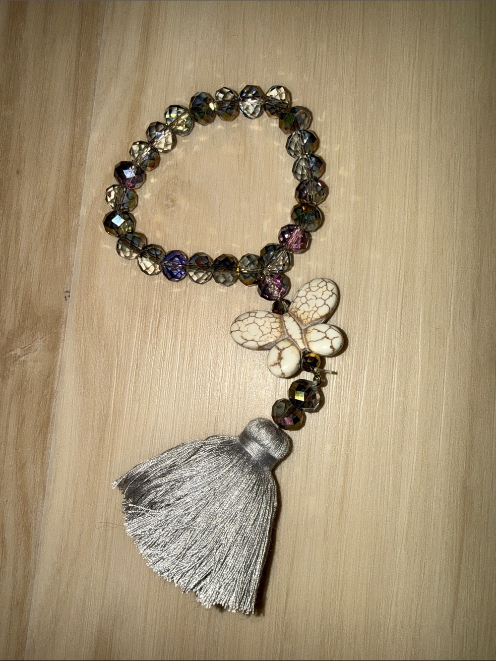 Multicolor Beaded Bracelet with White Stone Flower and Silver Tassel